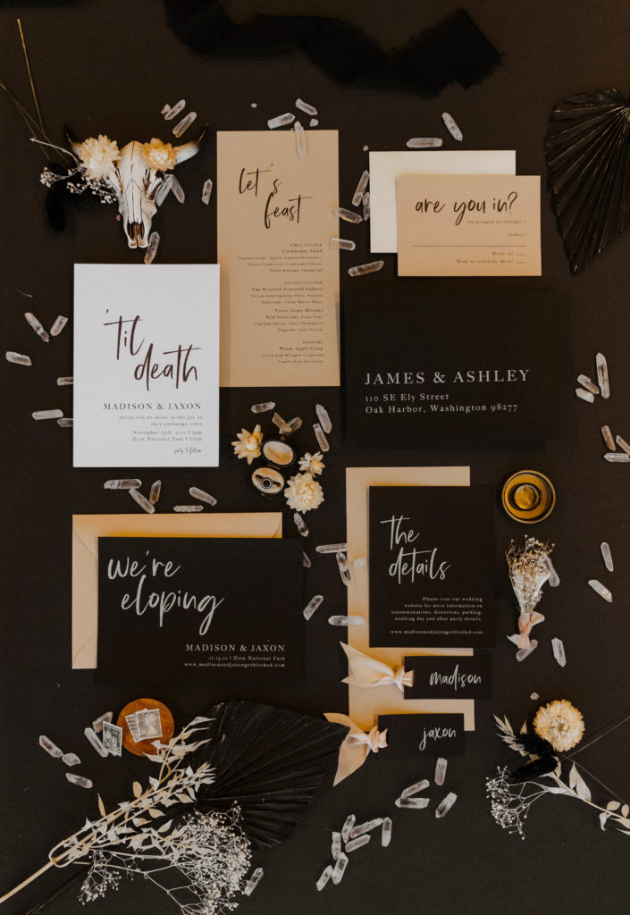 black and brown wedding details laid out