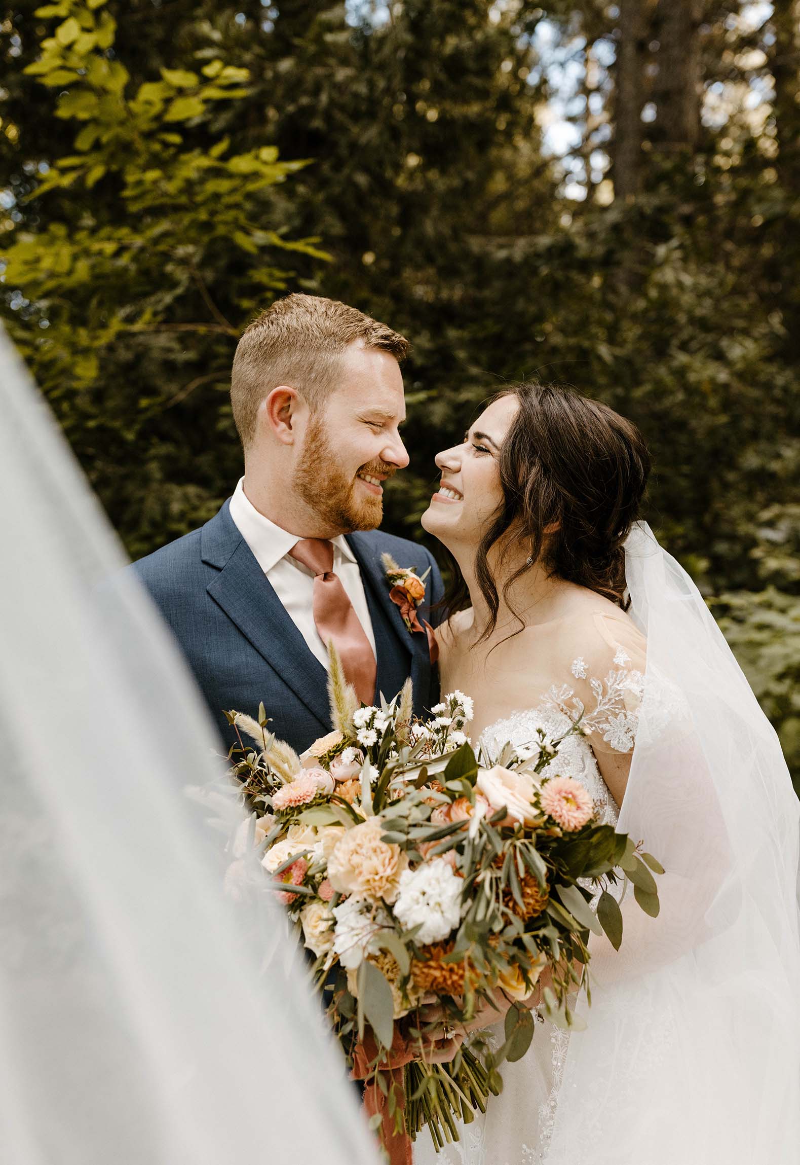 spring wedding couple at forest house lodge