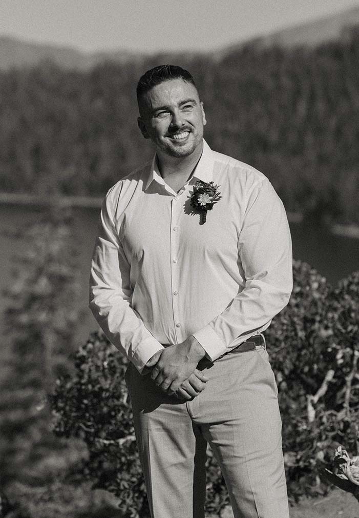 groom smiling at bride at their emerald bay elopement