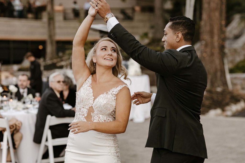bride and groom dancing at the resort at squaw creek