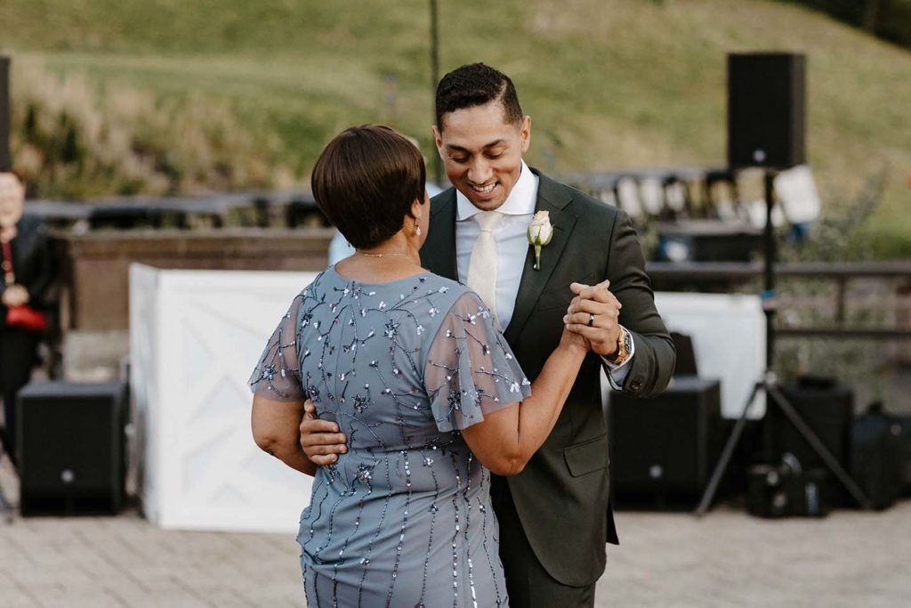 groom dancing with his mom at the resort at squaw creek