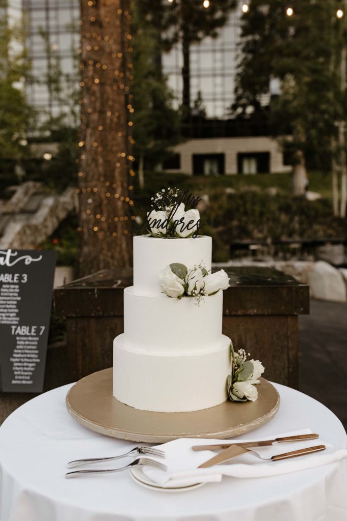 simple white and modern wedding cake at the resort at squaw creek