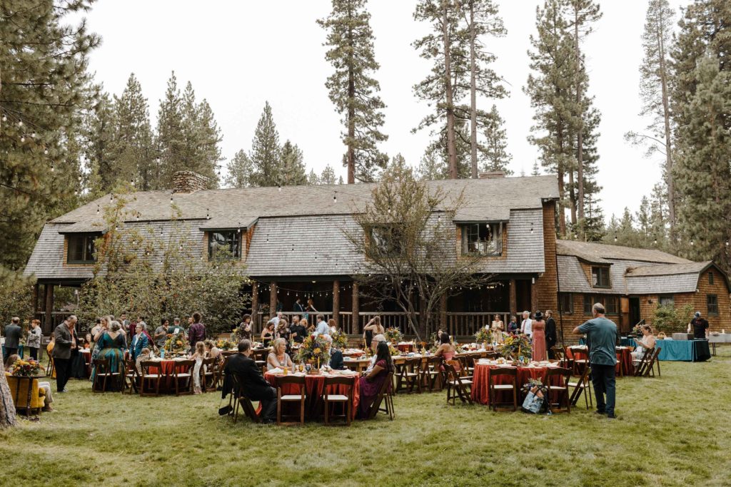 Wedding guests sitting down at tables during reception at valhalla in Lake Tahoe