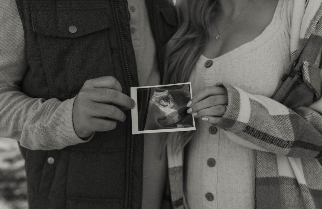couple holding ultrasound