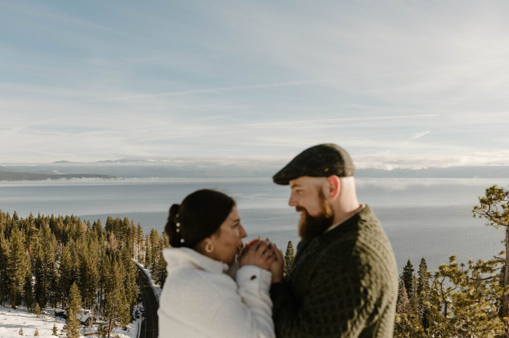elopement couple blurring overlooking lake tahoe