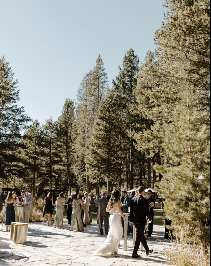 bride and groom walking at their wedding reception in lake tahoe