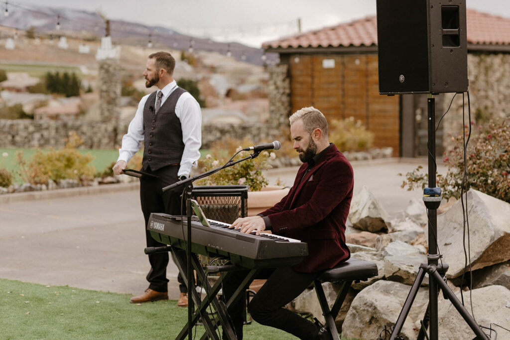 private musician playing music at tuscan falls wedding