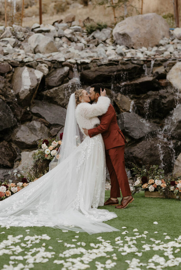first kiss at winter wedding at tuscan falls