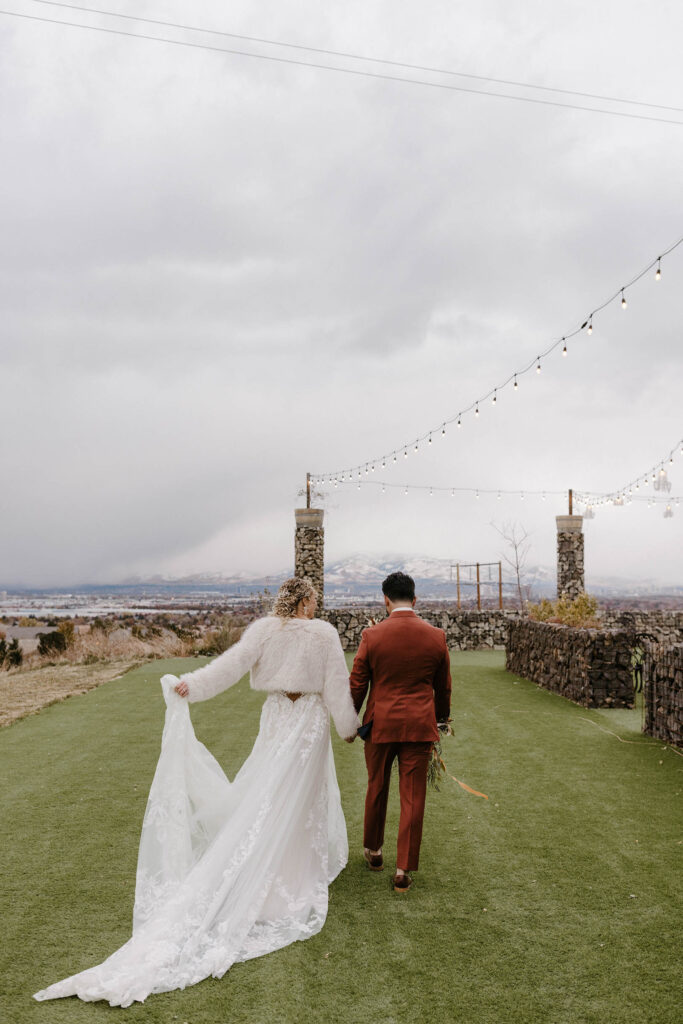 wedding couple walking together at tuscan falls