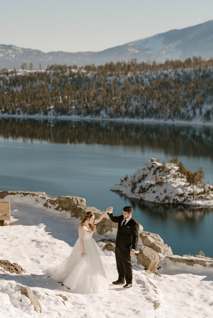 elopement couple dancing overlooking lake tahoe 