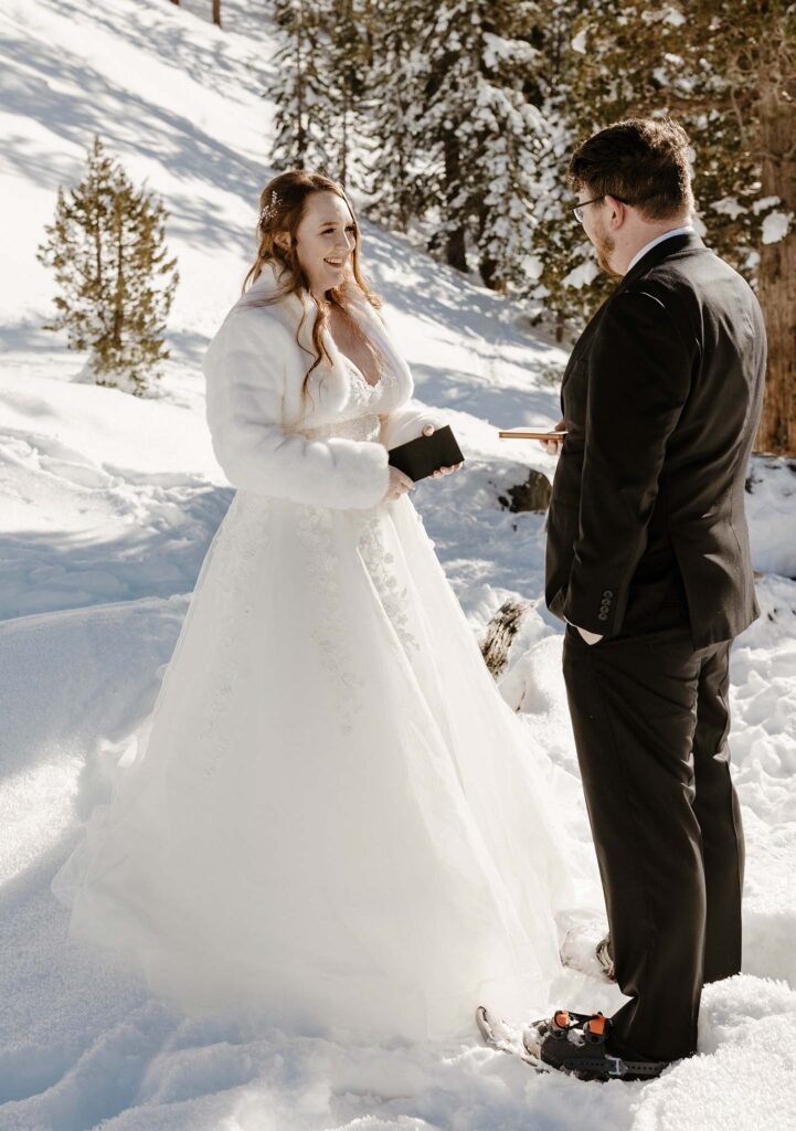 bride smiling while sharing vows in lake tahoe