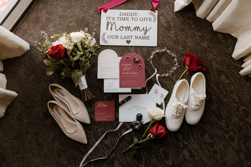 wedding flat lay details laid out for a winter wedding at the whitney peak hotel