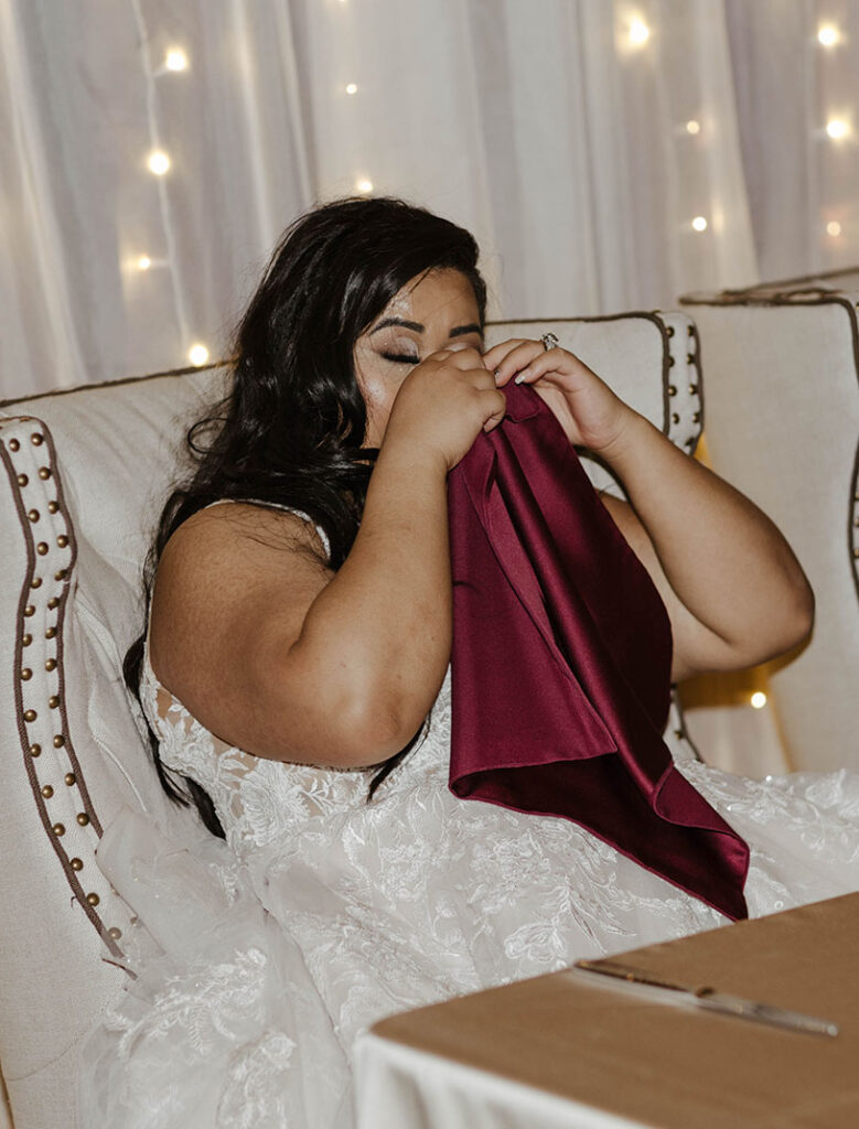 bride crying and wiping tears during speeches at the whitney peak hotel