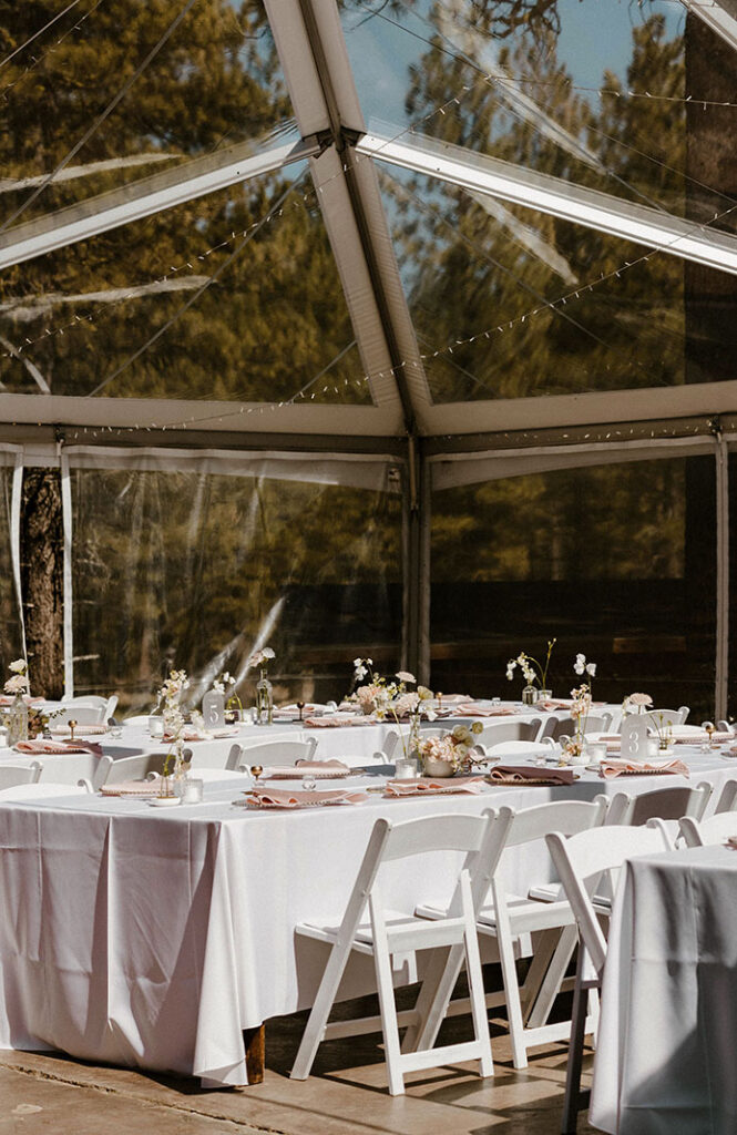 Wedding dinner tables and set ups with pink accents at the Chalet View Lodge