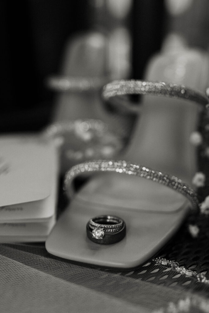 Wedding rings on brides elopement shoes in Lake Tahoe