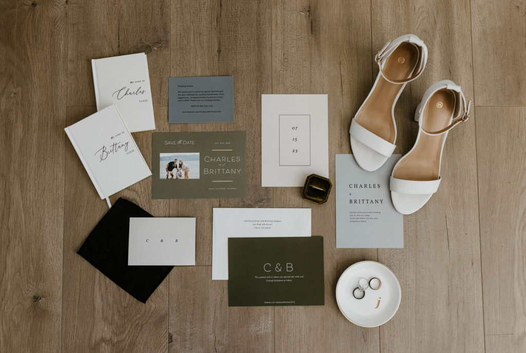 Wedding details in flat-lay with green and dark grey in Lake Tahoe
