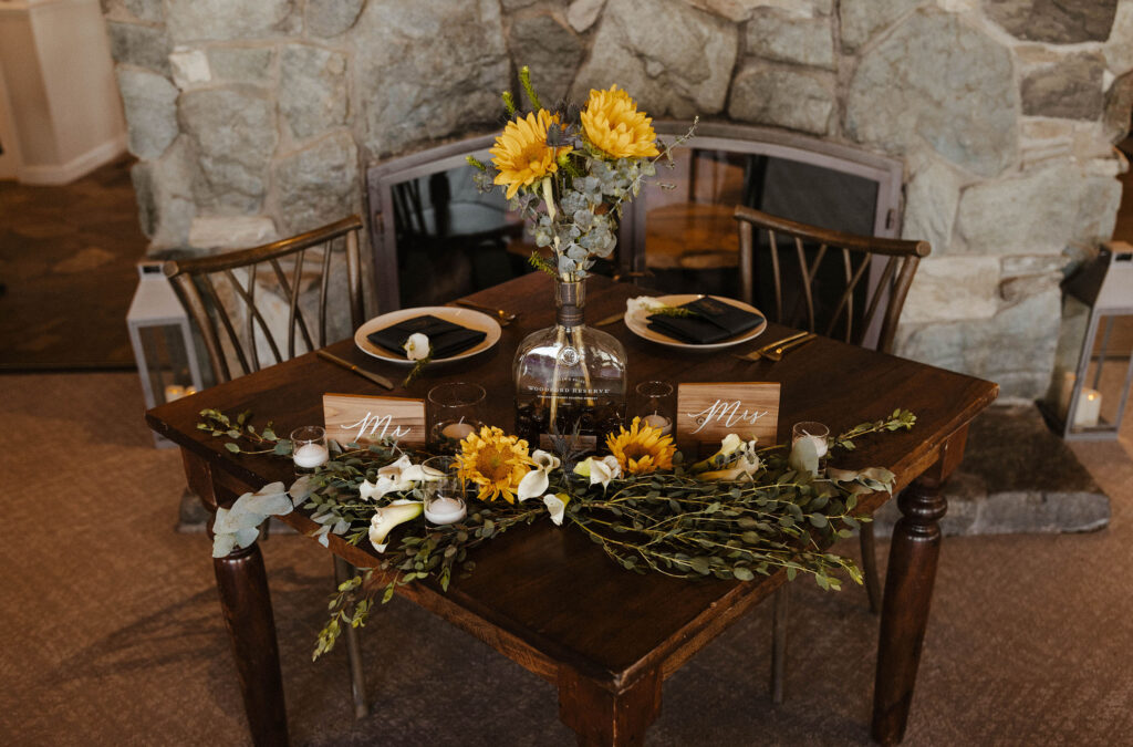 Wedding reception table for wedding couple with mr and mrs signs and sunflowers at the Tannenbaum