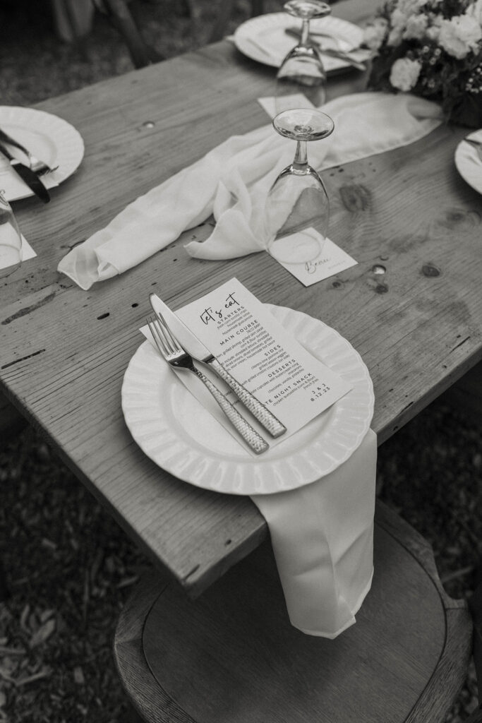 simple table settings at a summer wedding at kinship ranch