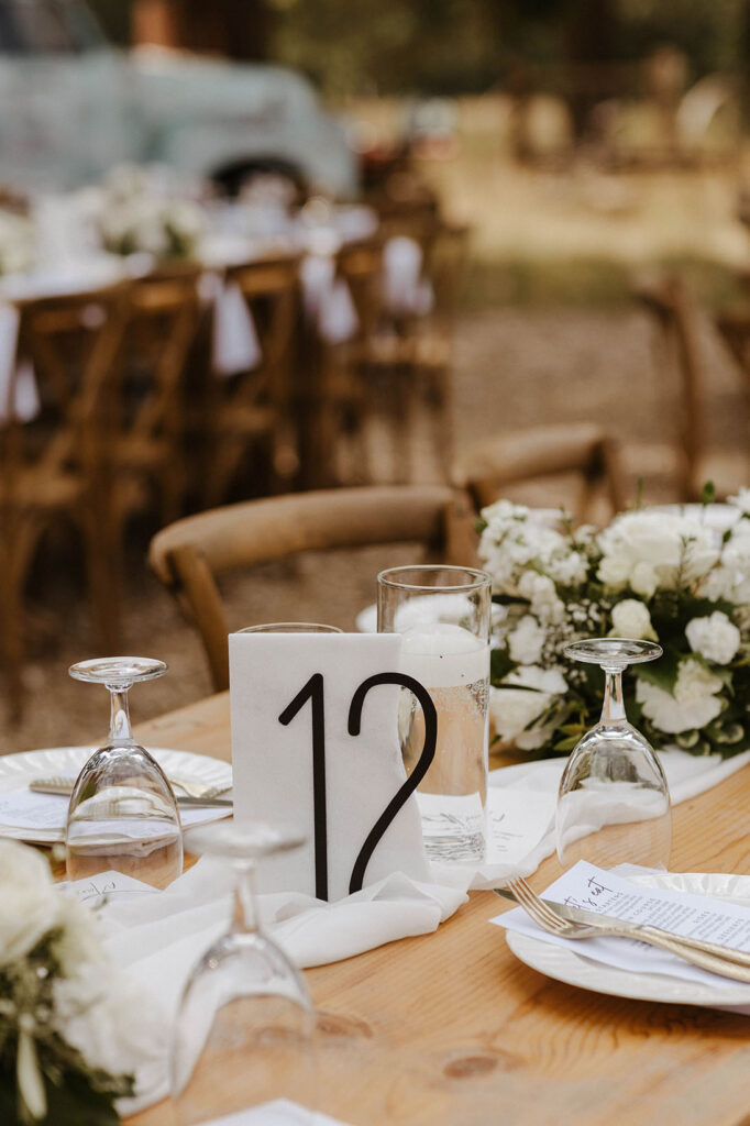 close up of table settings at a summer wedding at kinship ranch