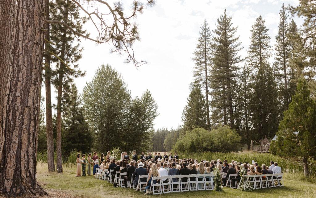 overview of all the guests during a summer ceremony at kinship ranch