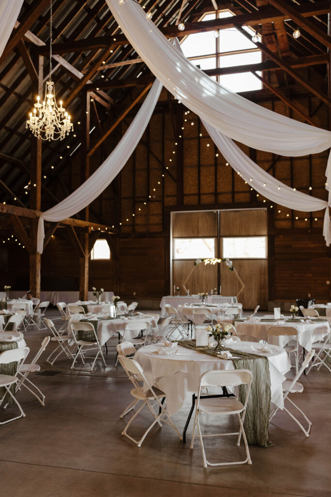 Wedding reception with white lights and decor inside the Corner Barn