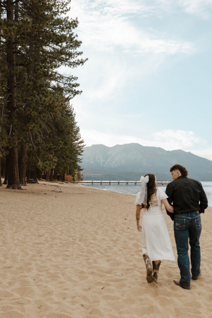 engagement couple walking on the beach in south lake tahoe