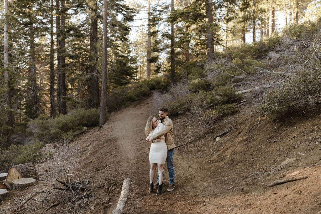 couple hugging at eagle rock lake tahoe