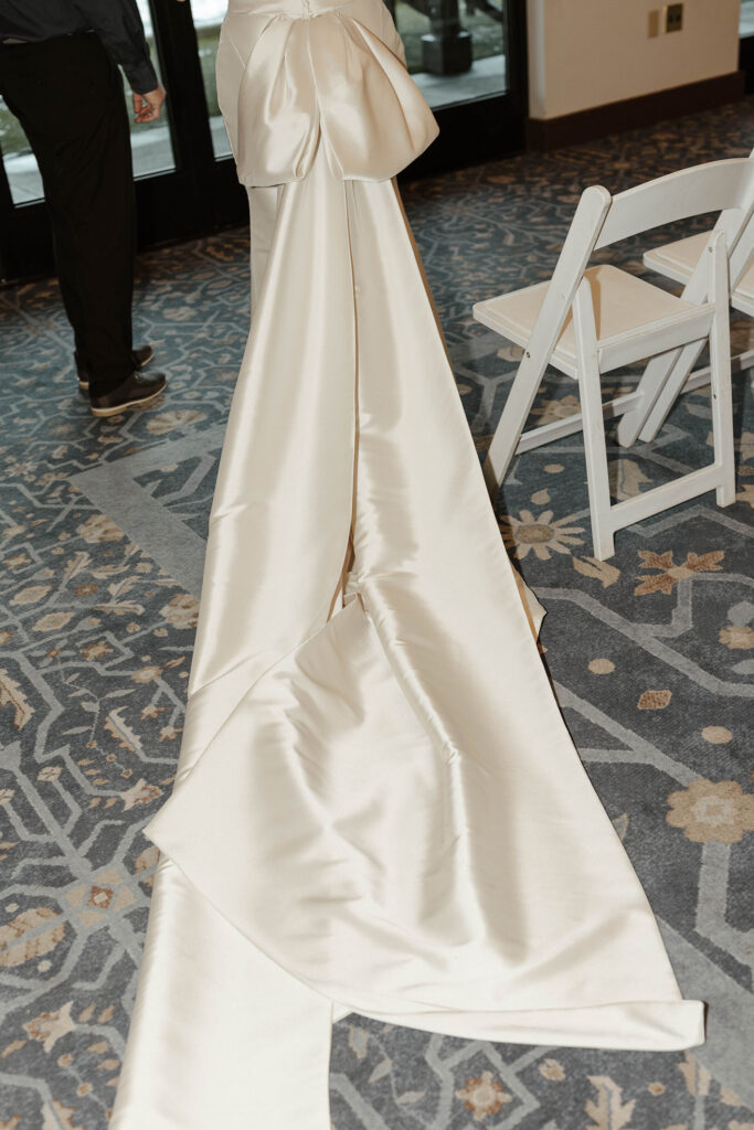 brides silk classic wedding dress with a large bow