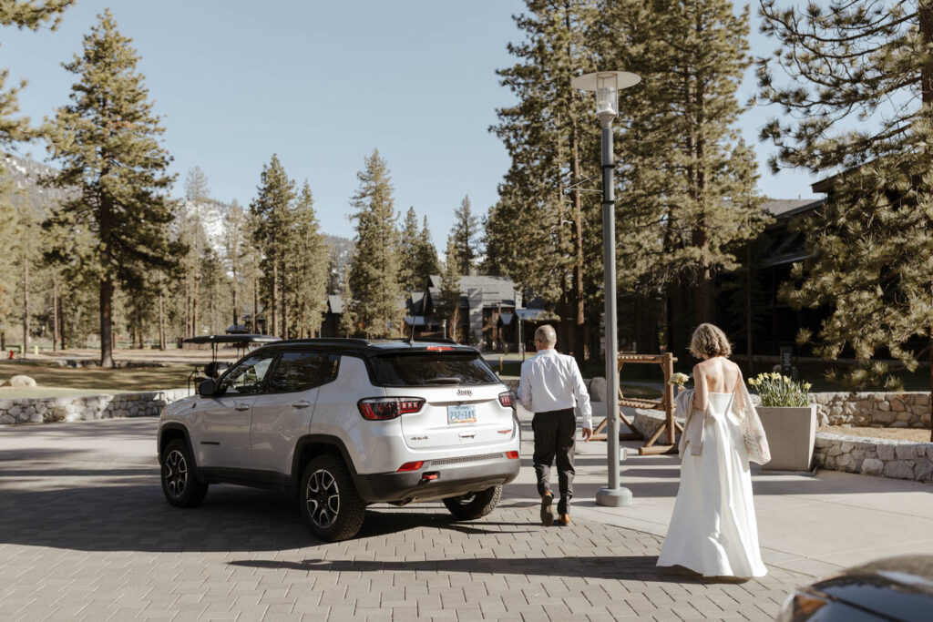 elopement couple walking to their car in lake tahoe 