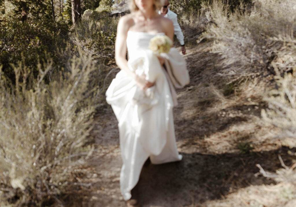 blurry photo of a bride hiking in lake tahoe 