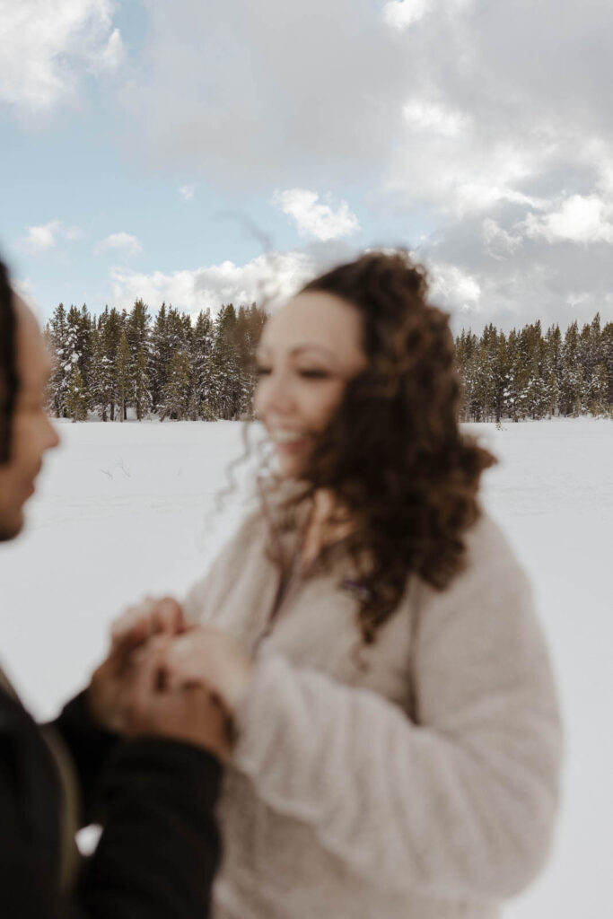 couple blurry overlooking mount rose meadows