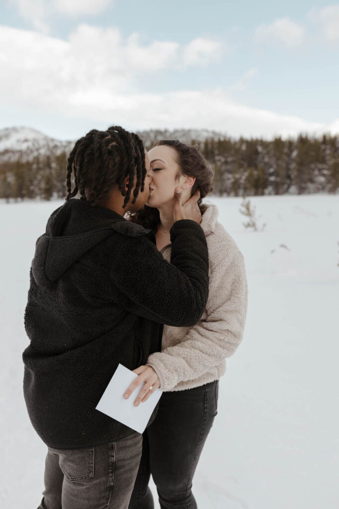 couple kissing at mount rose meadows