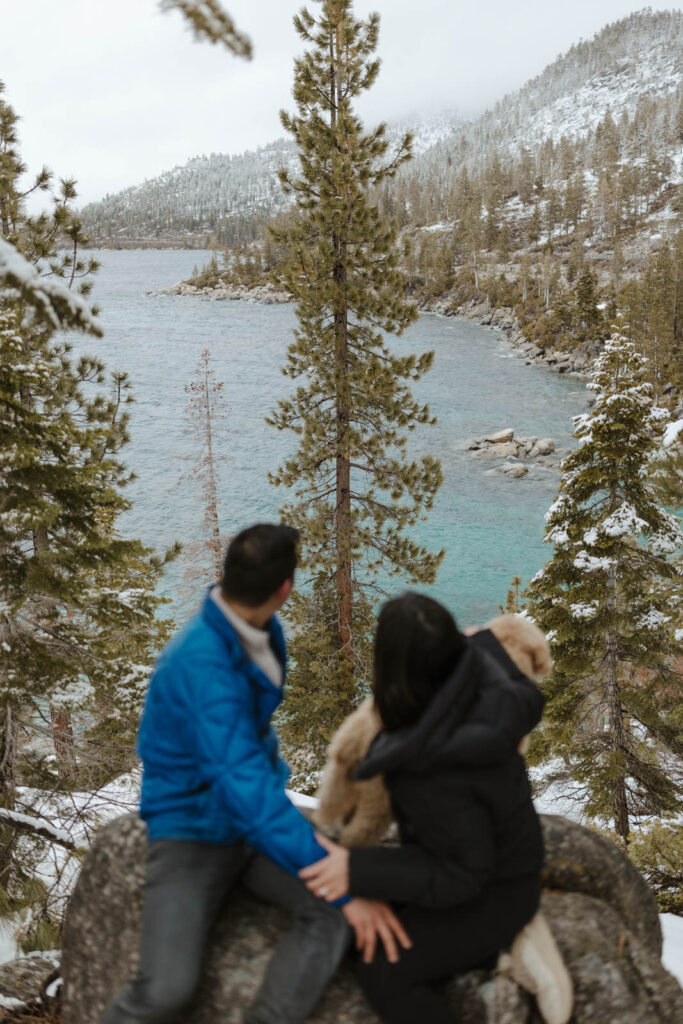 couple looking out at the lake in lake tahoe
