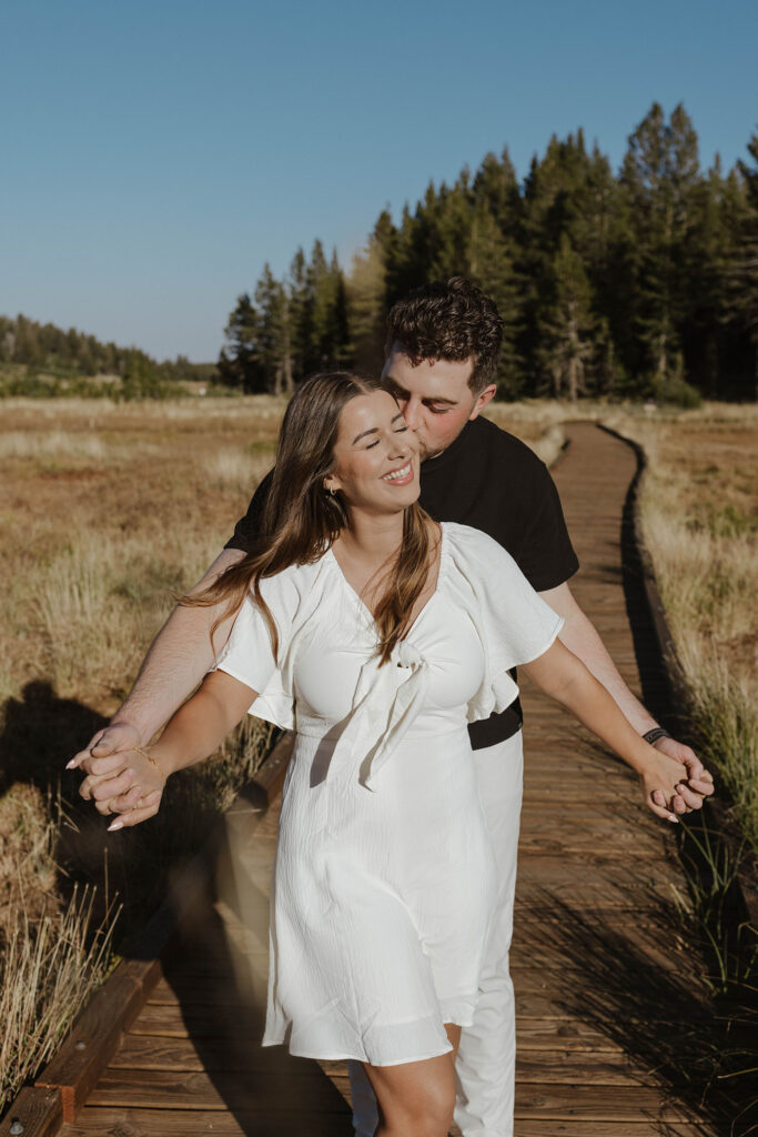 couple hugging at mount rose meadows in lake tahoe 