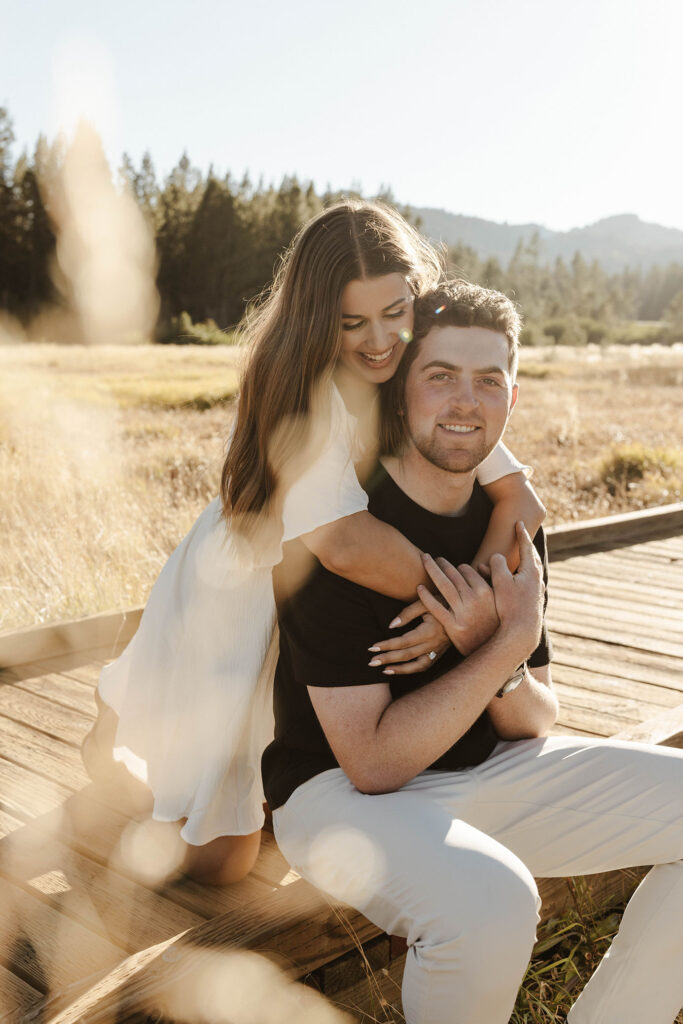 woman hugging man from behind at mount rose meadows