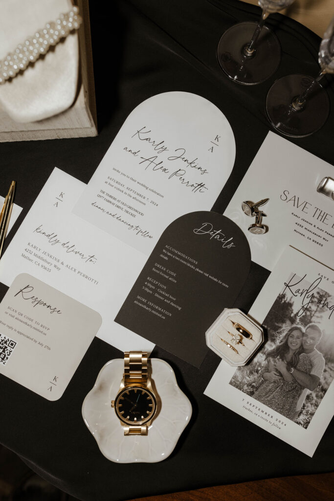 Wedding details in flat lay with black and white theme at Timbers at Old Greenwood