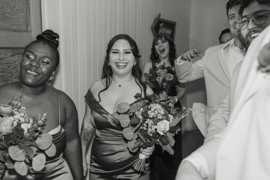 Wedding guests and bridal party smiling and celebrating at Valhalla in Lake Tahoe
