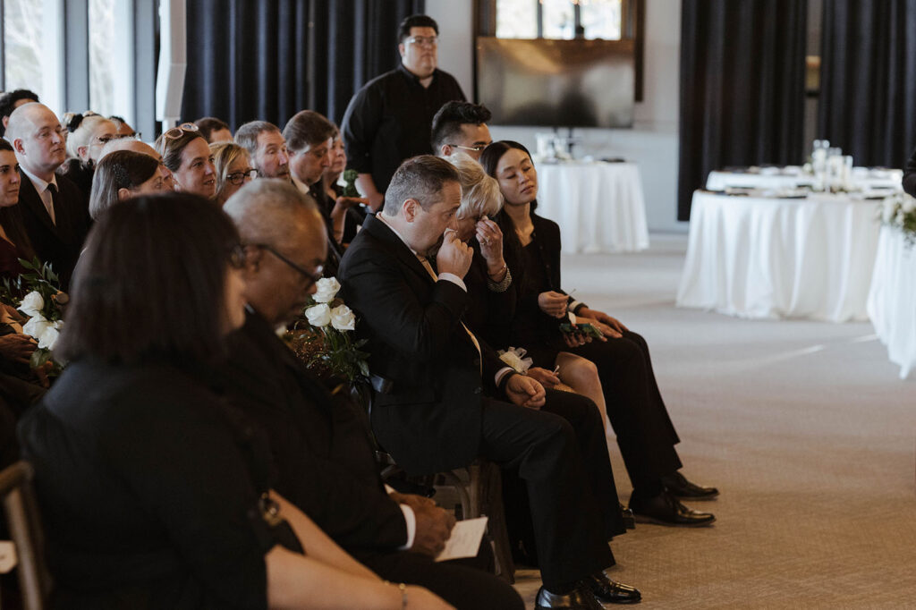 Wedding couple's parents emotional during winter ceremony at the Tannenbaum