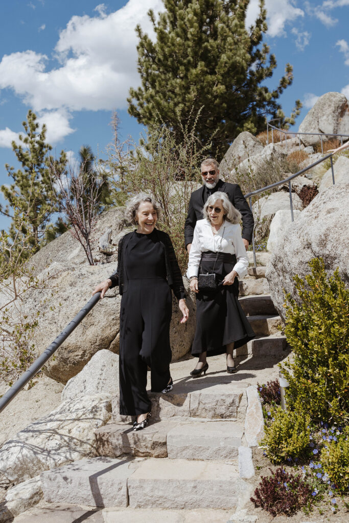 wedding guests walking down the stairs for a ceremony at tahoe blue estate