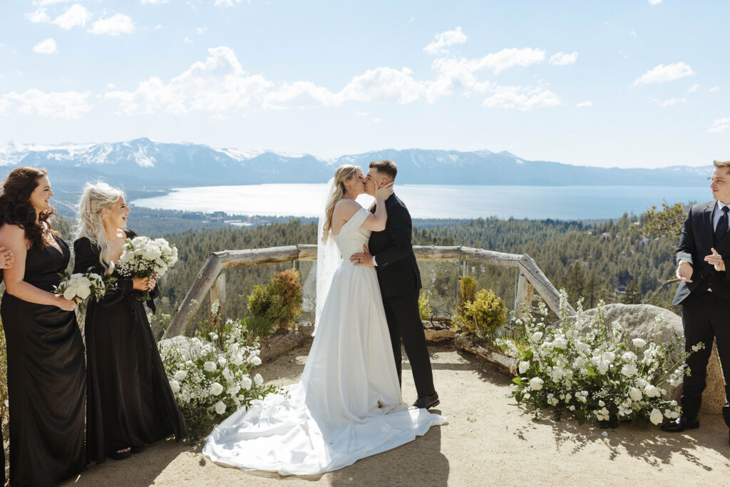 bride and groom share a first kiss during their ceremony at tahoe blue estate