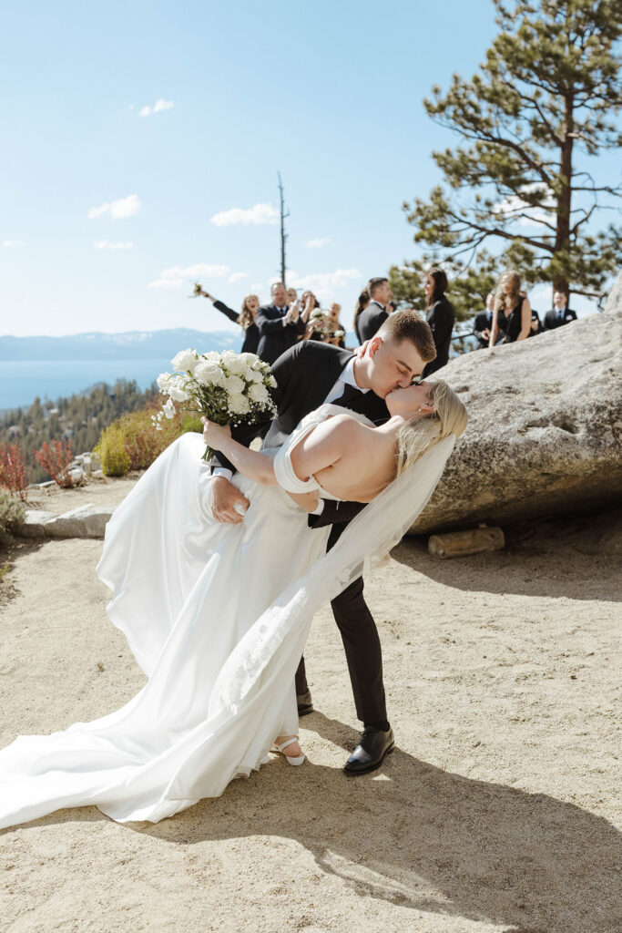 groom doing the dip kiss after their wedding ceremony at tahoe blue estate