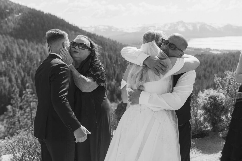 guests hugging the newlyweds at tahoe blue estate