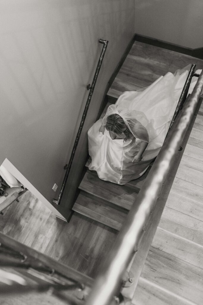 bride walking down the stairs in a house in donner lake