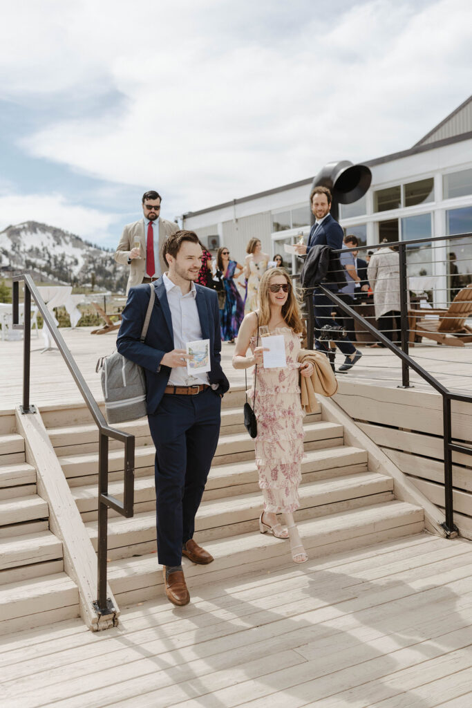 Wedding guests walking into ceremony together at High Camp