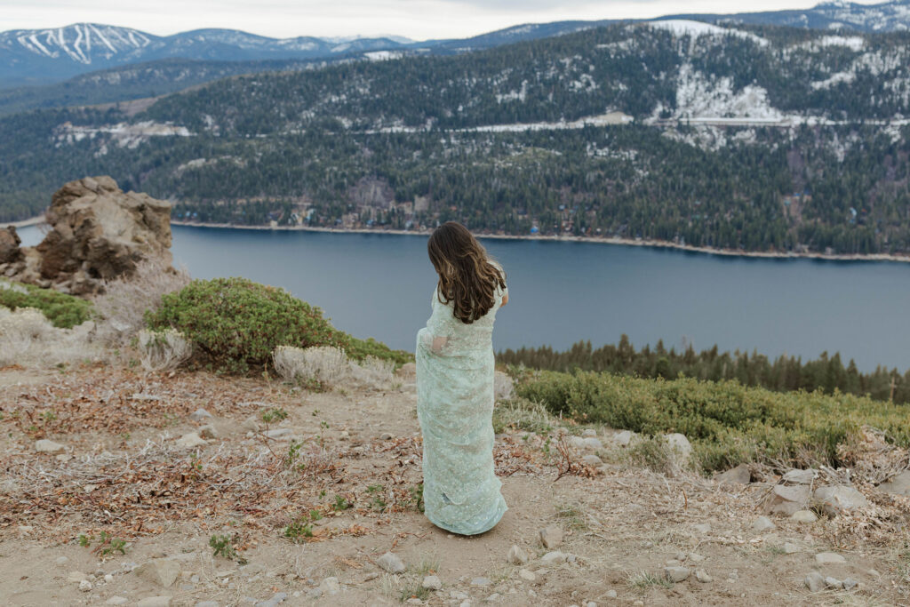 woman walking by lake tahoe 