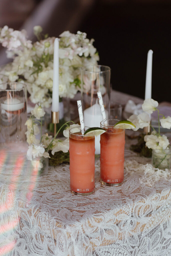 Wet Woodys sitting on wedding dinner table on top of white lace tablecloth at Garwoods Lake Tahoe