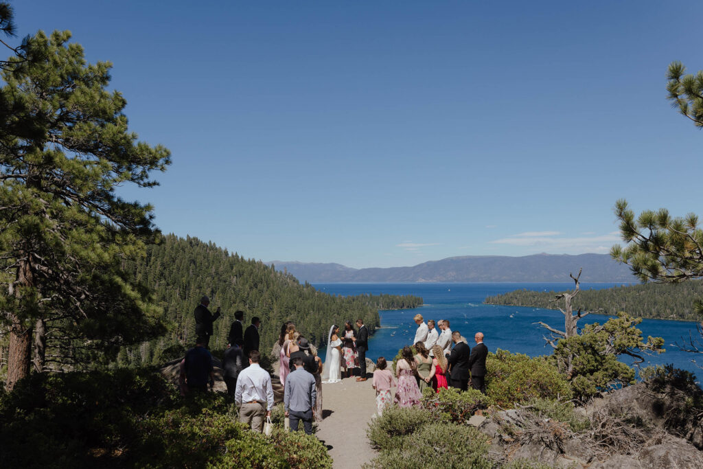 The bride and groom exchange vows with their closest guests overlooking Emerald Bay in Lake Tahoe